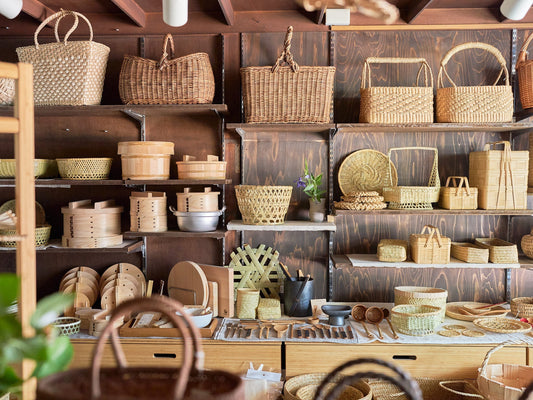 Interior of 1basketry displaying handcrafted baskets, bamboo ware, sieves, trays, and traditional household tools from Japan and around the world / 日本や世界各地の手仕事によるかごや竹細工、ざる、盆、暮らしの道具が並ぶ市川籠店の店内